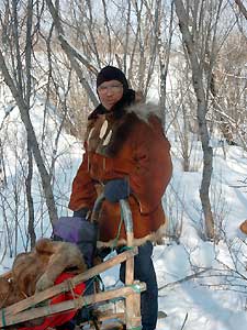 A dog-drawn sledge driver Anatoly.